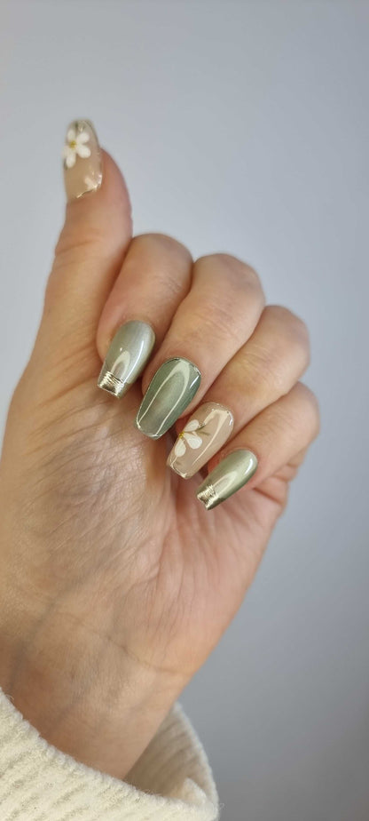 Hand wearing Tala short square press-on nails, applied professionally by Nail Addict.