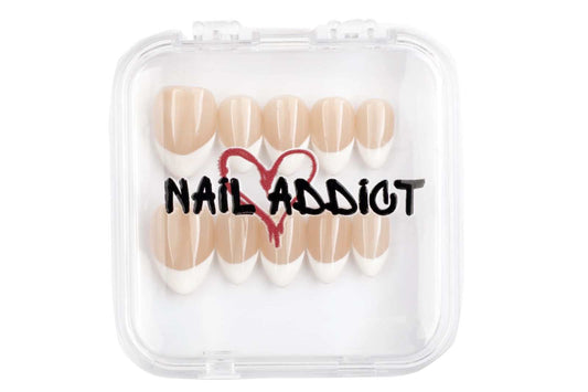  Karima classic French tip stiletto press-on nails by Nail Addict, in a clear box with the brand's logo.


