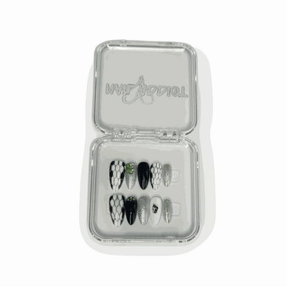 Branded Nail Addict packaging box for the Ajman Aesthetic press-on nail set.