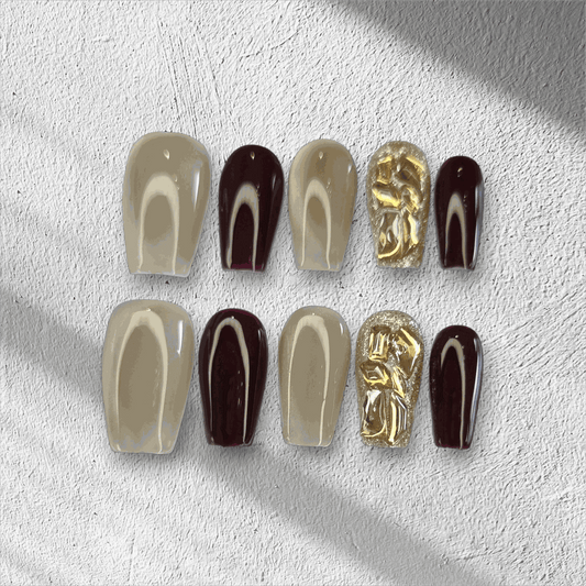  Amani nude and brown long coffin press-on nails by Nail Addict, with abstract heart patterns and solid accent nails