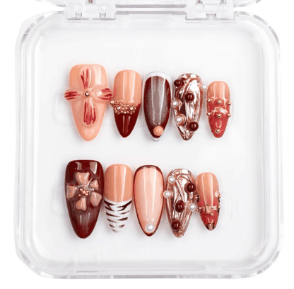 Arabian Nights press-on nail set, long almond shape, dark shimmering color.