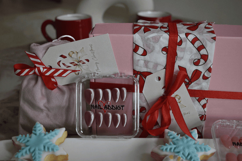 Nail art product with decorative packaging and cookies on a table