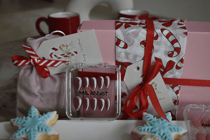 Nail art product with decorative packaging and cookies on a table