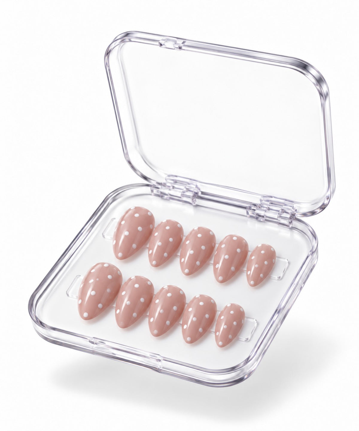 Dolce Dot nude-pink almond polka-dot press-on nails in clear case on white background