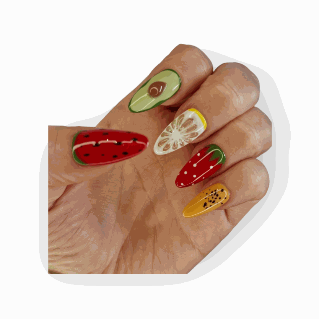 Model showcasing the Fujairah Fruity Flair press-on nails, fun and colorful design.