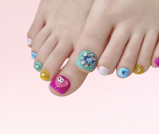 Vibrant Kai pedi press-on toe nails set, perfect for summer pedicures.