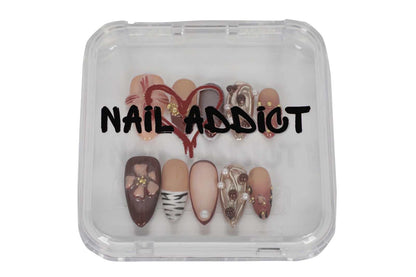 Luxurious packaging for the Arabian Nights press-on nails, elegant box design.