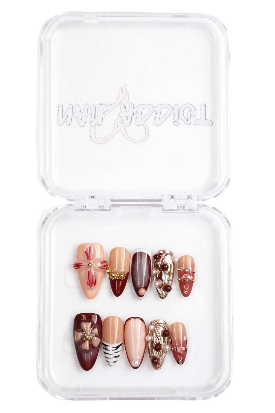 Close-up of the luxurious packaging for the Arabian Nights press-on nails.