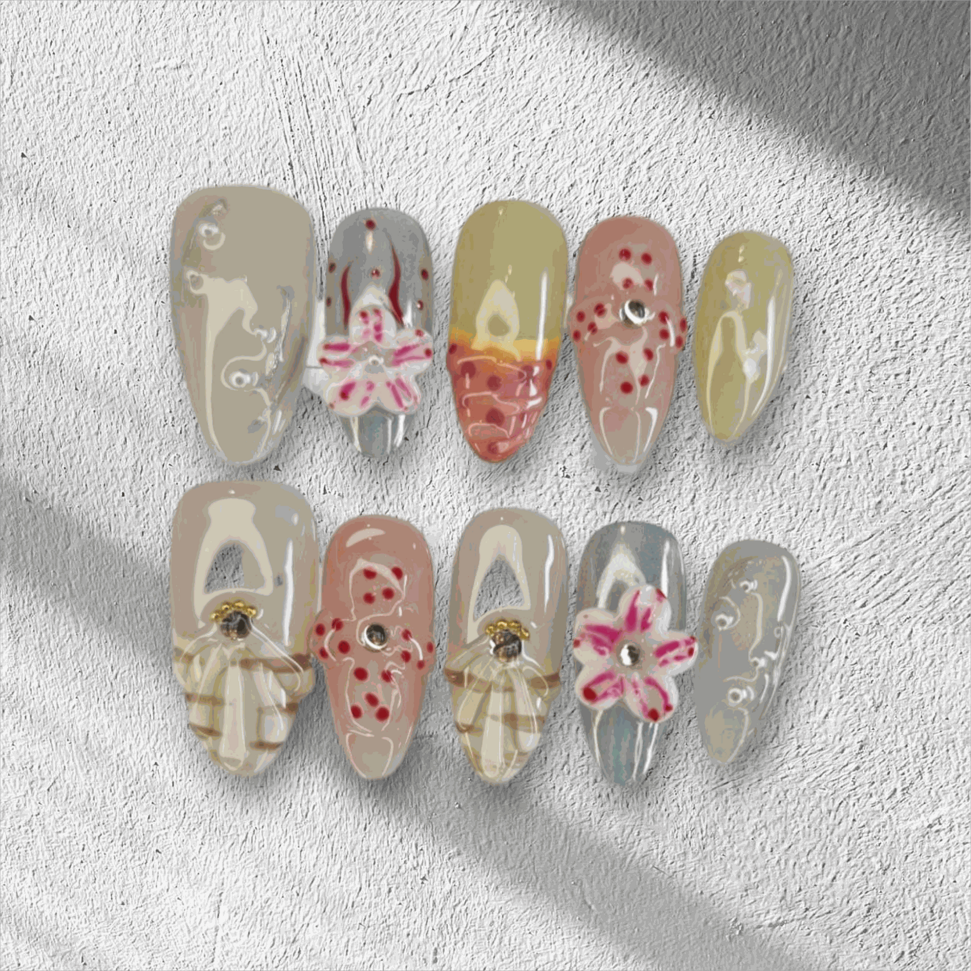 Madinah Majesty black, pink, and chrome coffin press-on nails by Nail Addict, with heart and butterfly gems