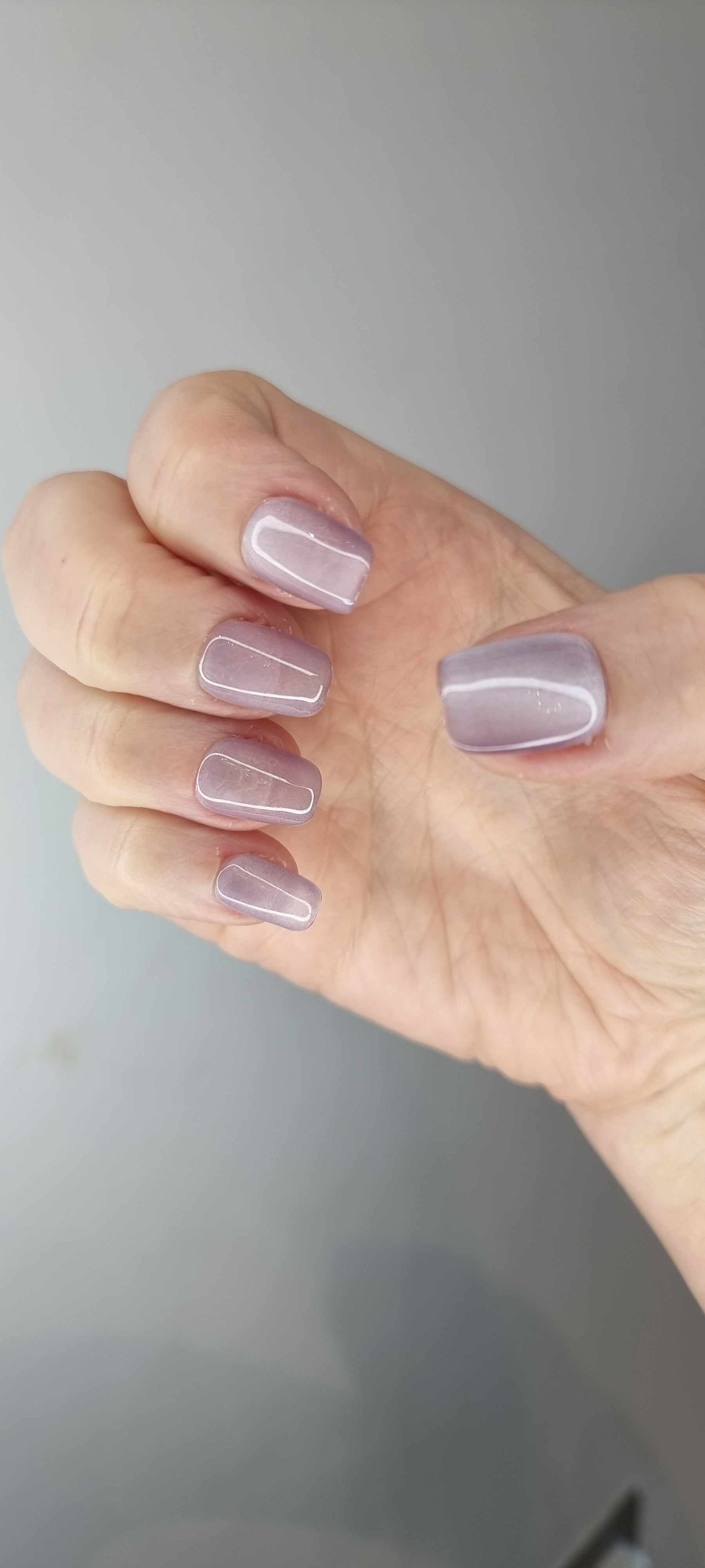 Manama Majesty black and blush French tip square press-on nails by Nail Addict, featuring a bow and pearl details.