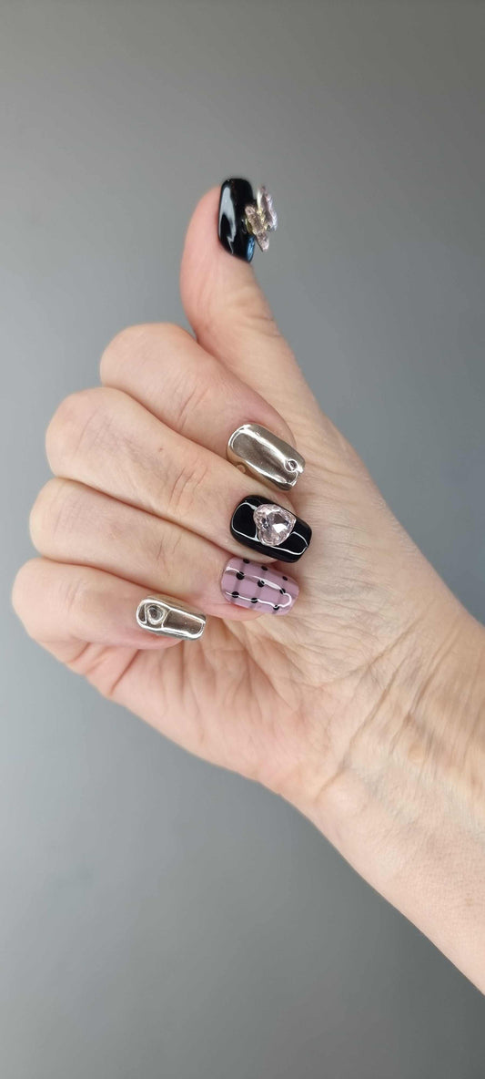 Maysoon chrome, plaid, and polka dot coffin press-on nails by Nail Addict, with rhinestone accents.