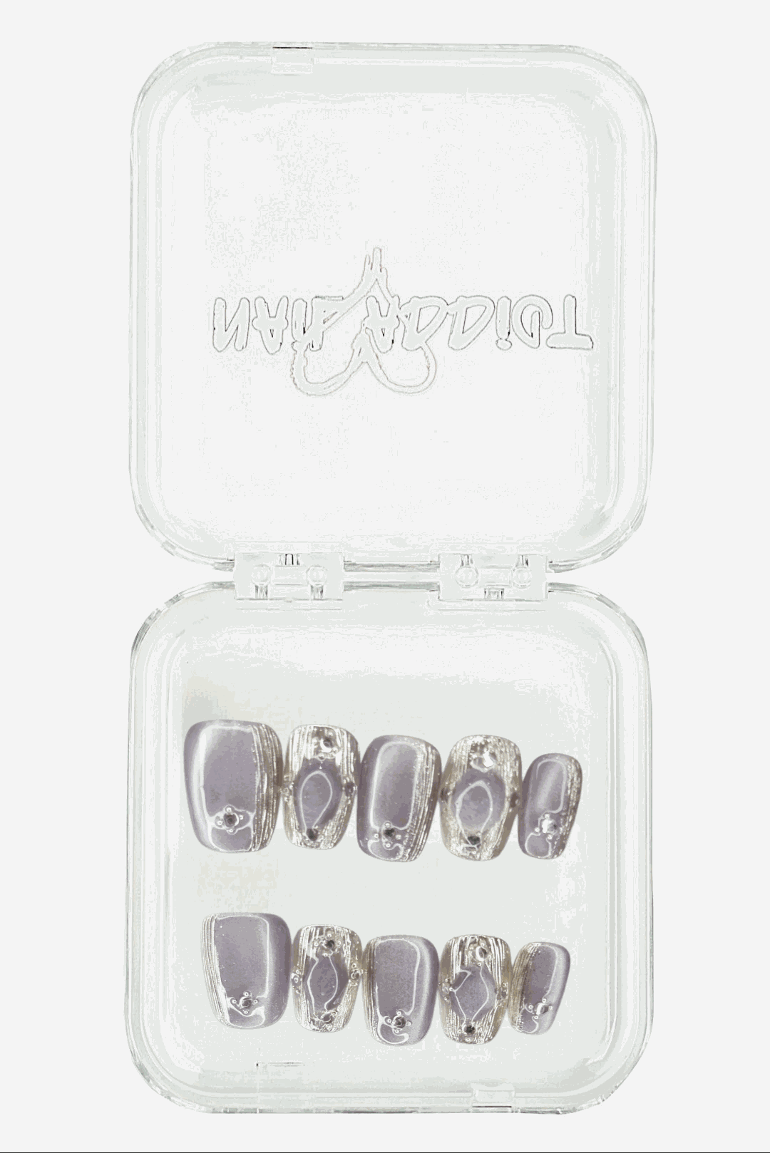 The minimalist Diriyah Elegance press-on nail set, displayed in its clear, branded Nail Addict case.