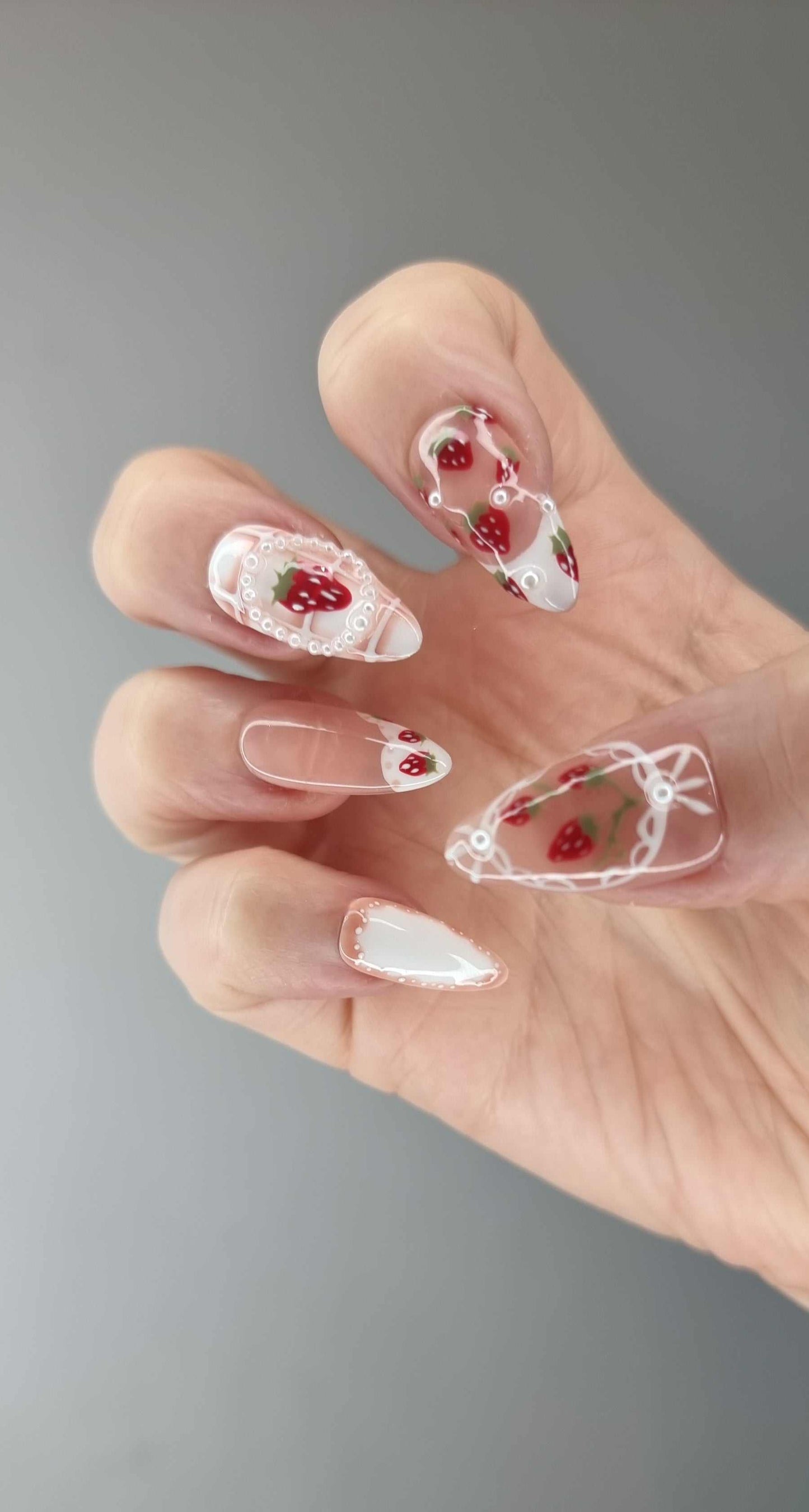 Omani Oasis press-on nails in a long almond shape, showcasing the elegant design.