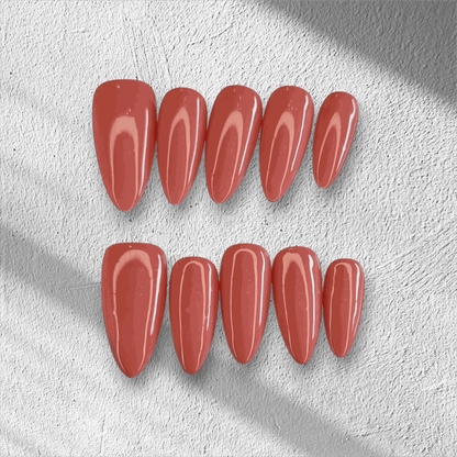 Full set of Rose press-on nails featuring a pink floral design, displayed in the box.