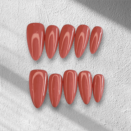 Full set of Rose press-on nails featuring a pink floral design, displayed in the box.