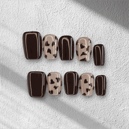 Full set of Samira nude short square press-on nails, displayed in packaging.