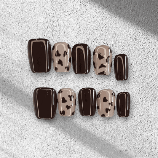 Full set of Samira nude short square press-on nails, displayed in packaging.