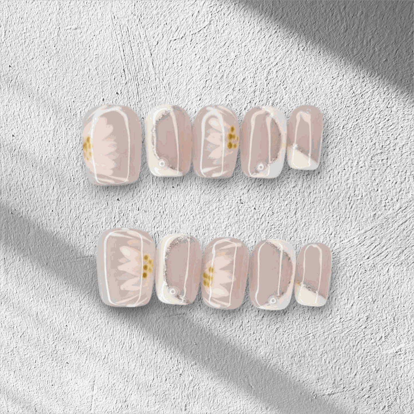 Hand wearing Samira press-on nails, applied professionally by Nail Addict.