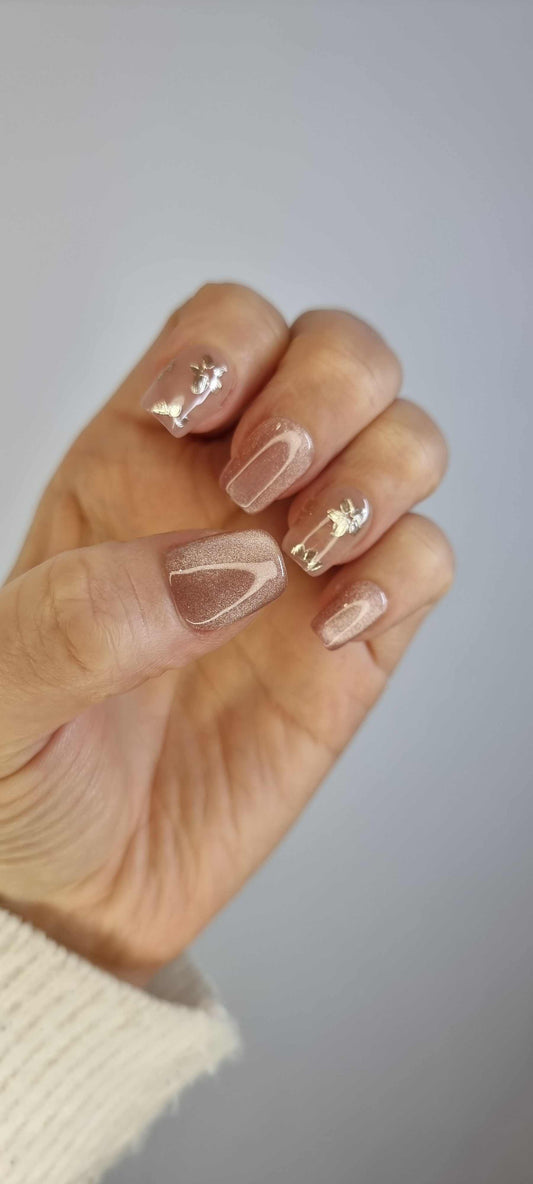 Close-up of Selina nude artificial nails with a high-gloss finish.