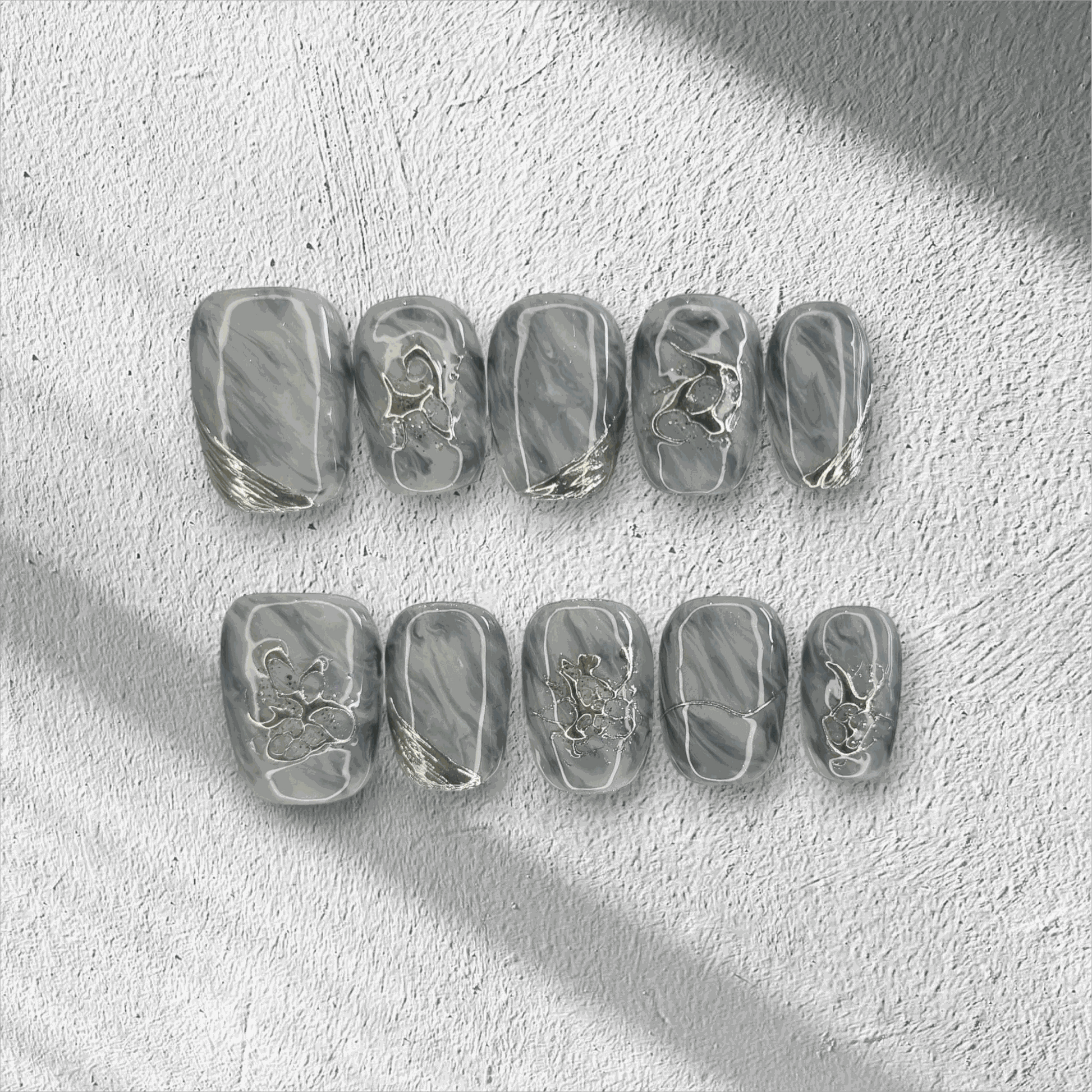 The Shaden press-on nail set, featuring a translucent design, displayed in the box.