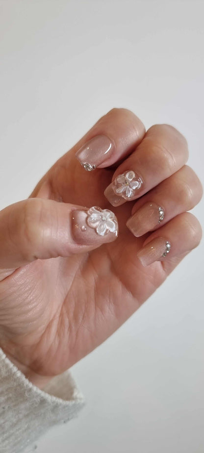 Set of Shaima false press-on nails in a glossy, light brown color.