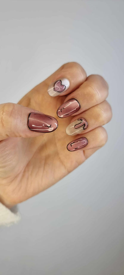 Close-up showing the unique swirled or marbled pattern on the Zayed Zeal false nails.